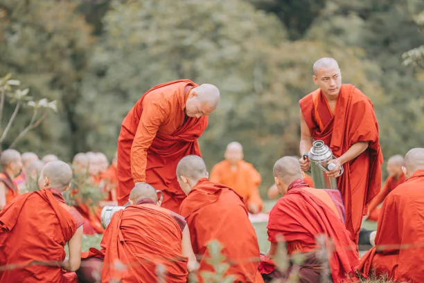 Monks serving food